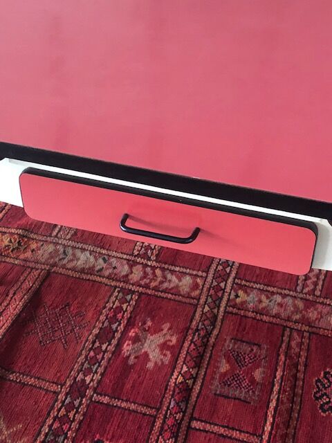 Table, chairs and kitchen furniture in red and black formica