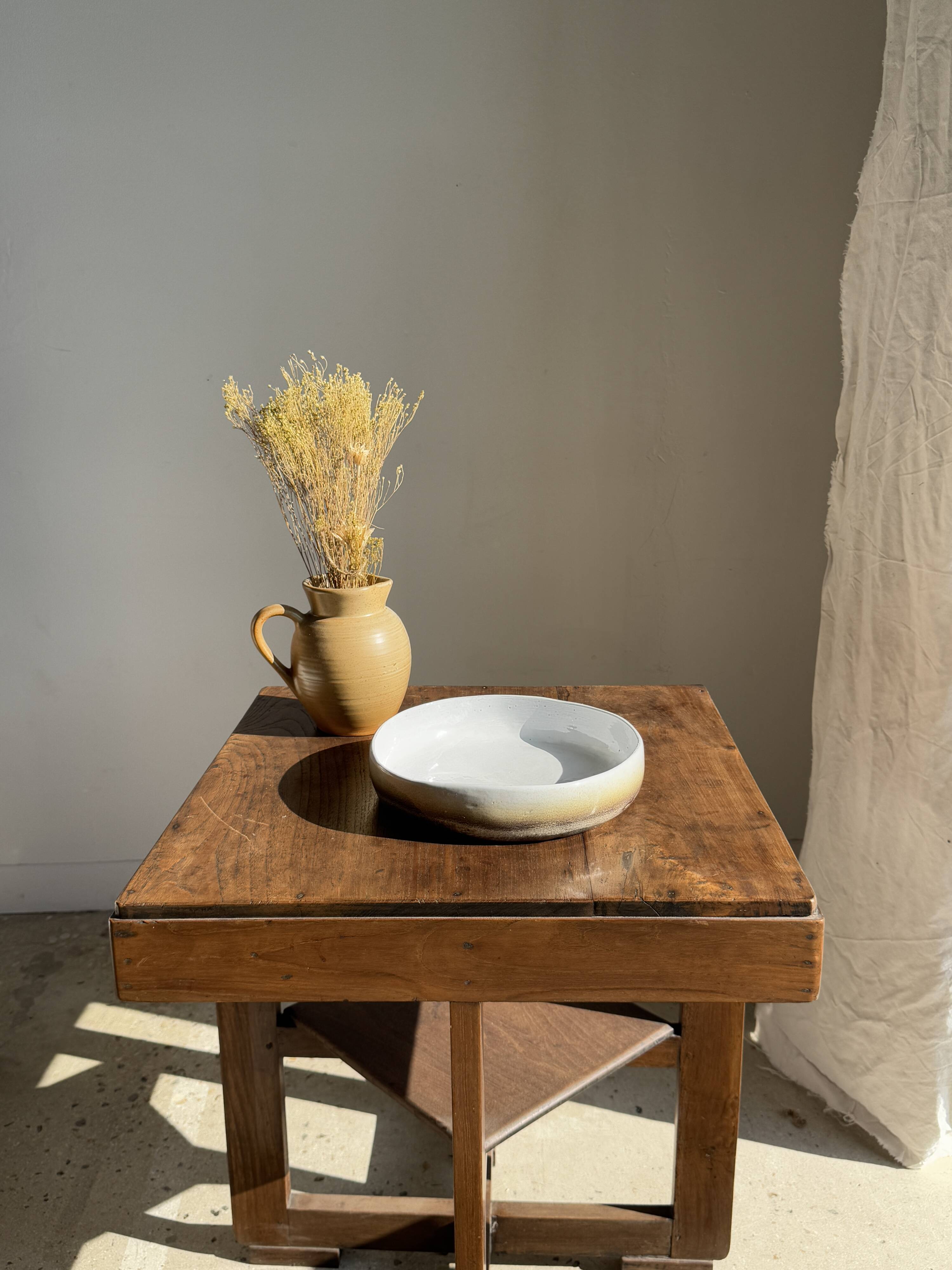 Large white and earthenware ceramic dish