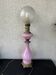 Lampe ancienne en opaline rose, laiton et globe gravé