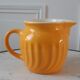 Yellow ceramic pitcher 70s