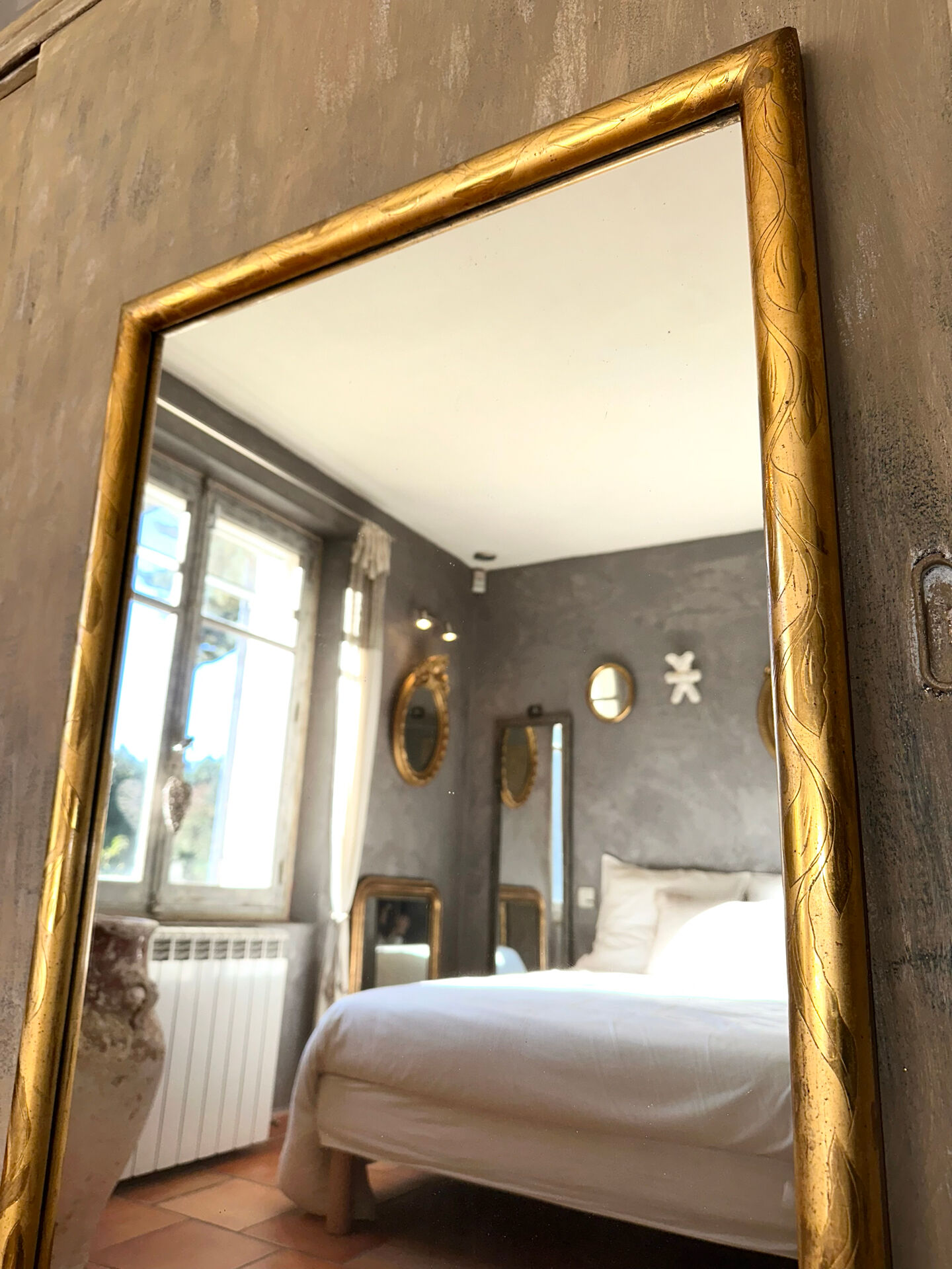 19th-century antique gilded mirror.