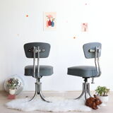Pair of workshop chairs from the 50s in chrome steel and imitation leather