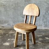 Small child's chair in natural blond teak back with three bars