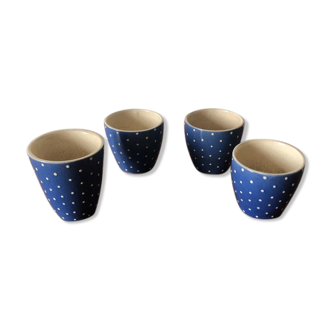 4 small blue artisan earthenware mugs with a white pea pattern