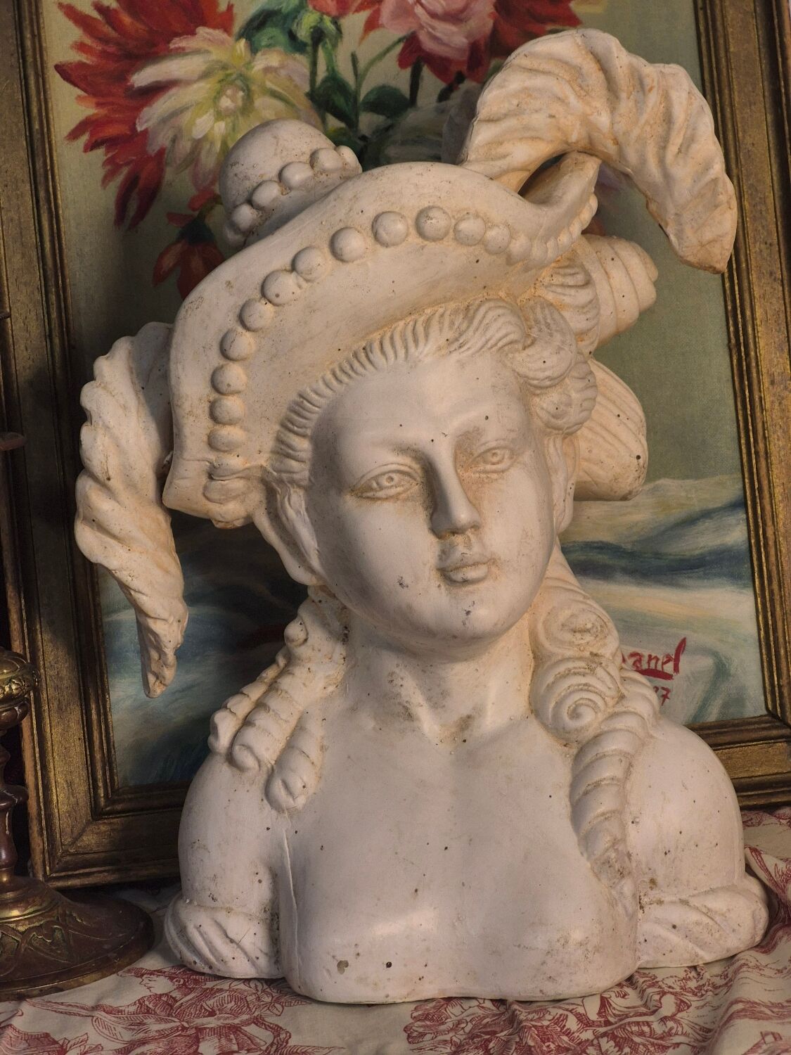Bust of a woman with a hat