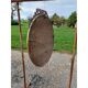 Miroir ovale en bois et stuc doré 19ème
