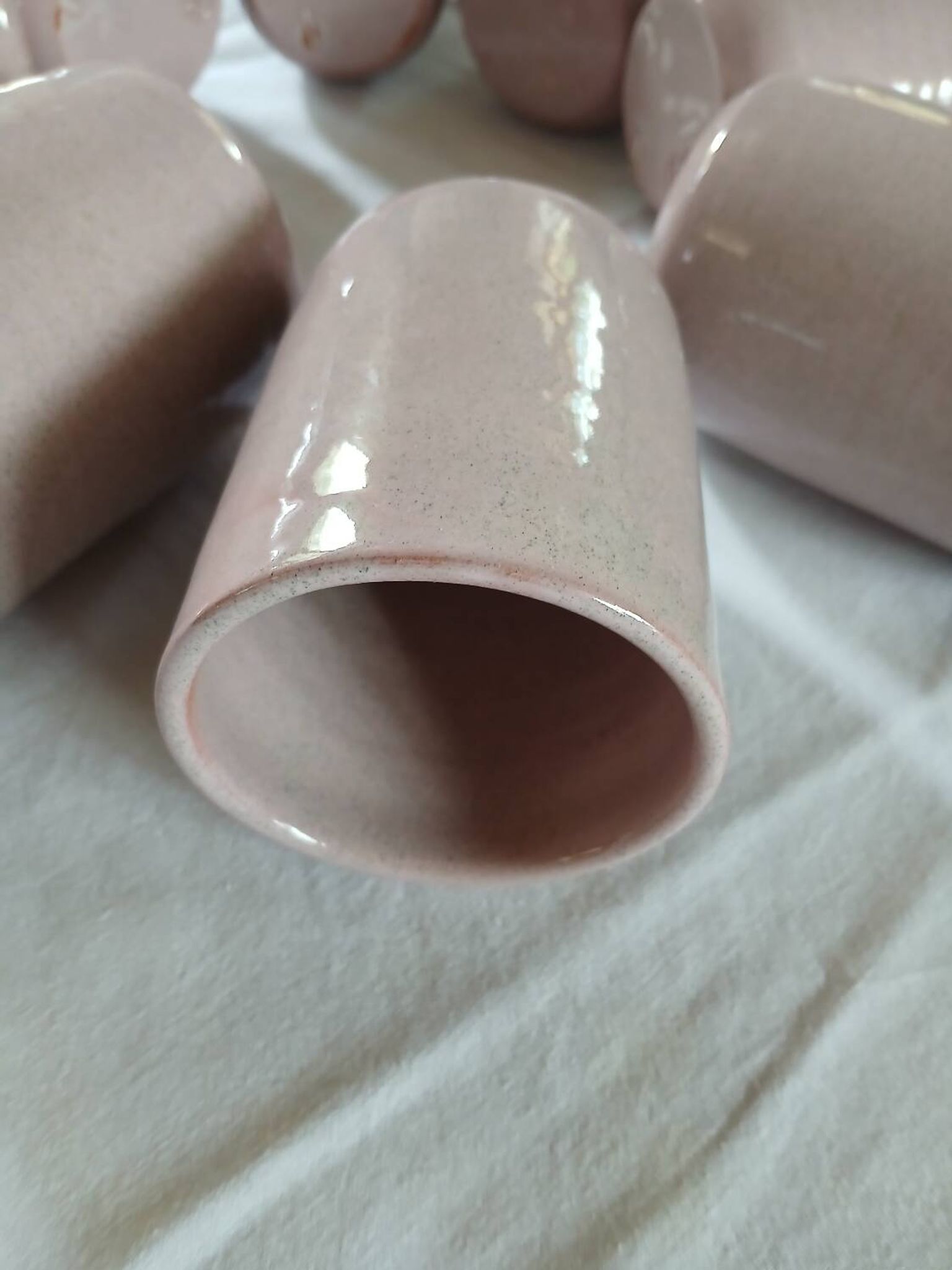 8 signed enamelled ceramic mugs