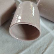 8 signed enamelled ceramic mugs