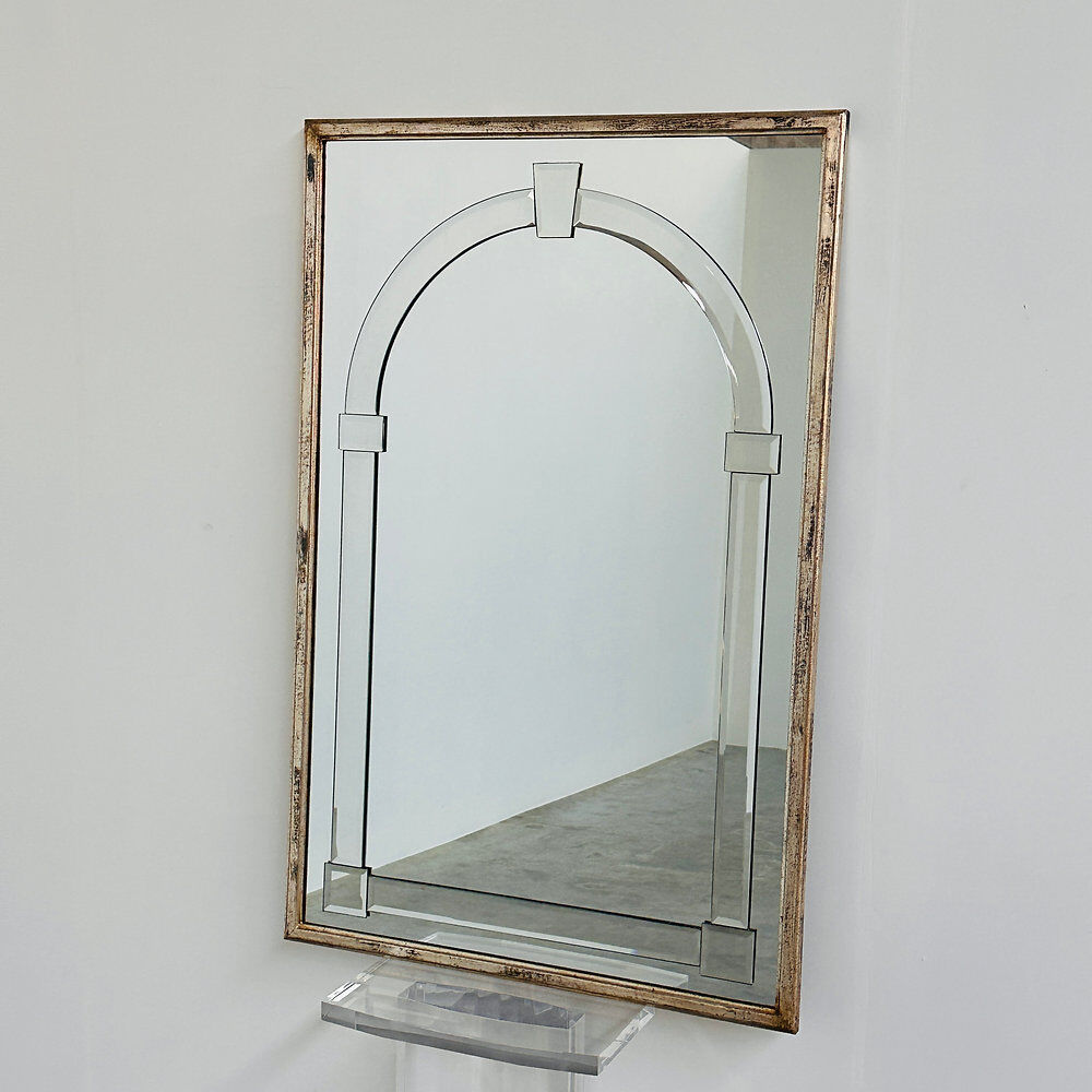 Large Art Deco style beveled wall mirror with architectural arch design