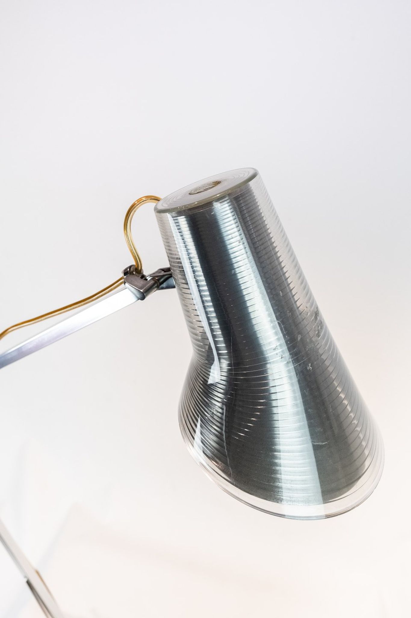 Table lamp of stainless steel and of italian design by Flos