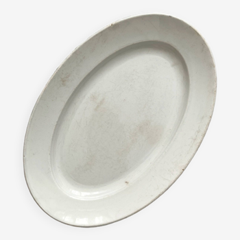 White oval dish in Creil and Montereau iron clay late 19th century