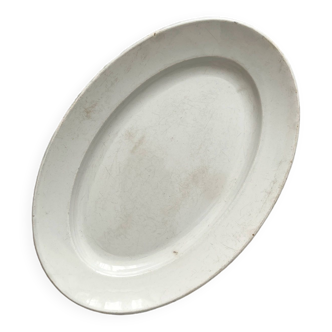 White oval dish in Creil and Montereau iron clay late 19th century