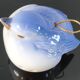 Vintage bird salt cellar in blue and white porcelain.