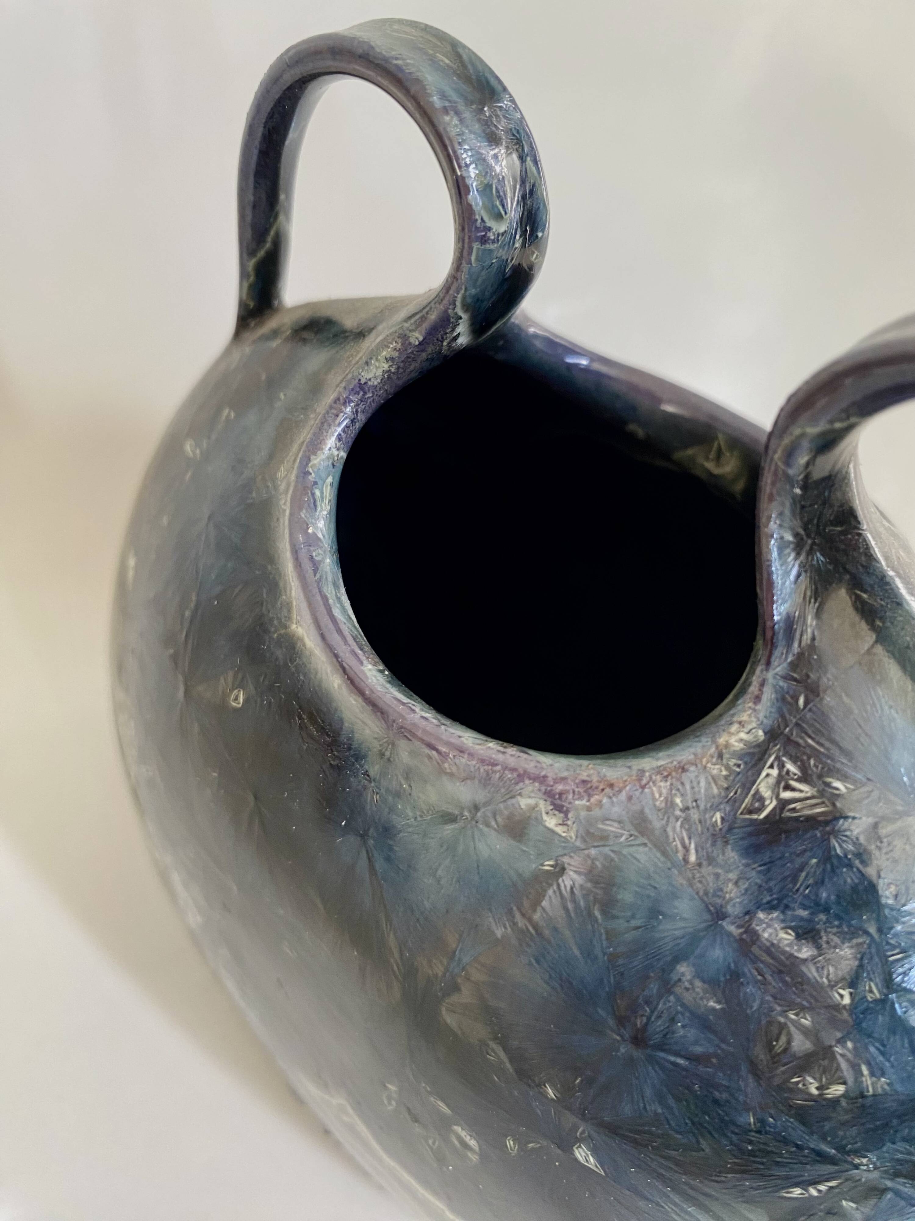 Iridescent ceramic vase with handles