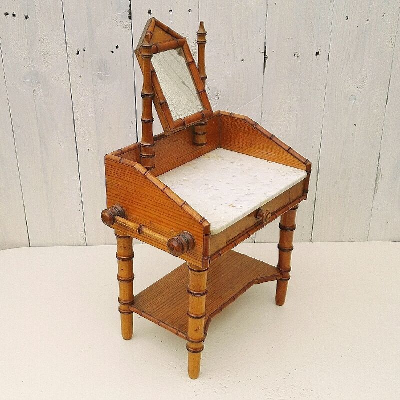 Former vintage bamboo doll hairdresser