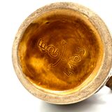 Monk-shaped slurry pitcher