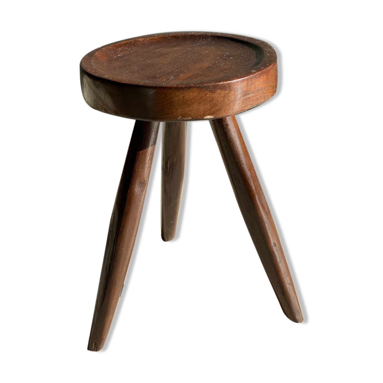 Brown solid wood stool seated circular dug