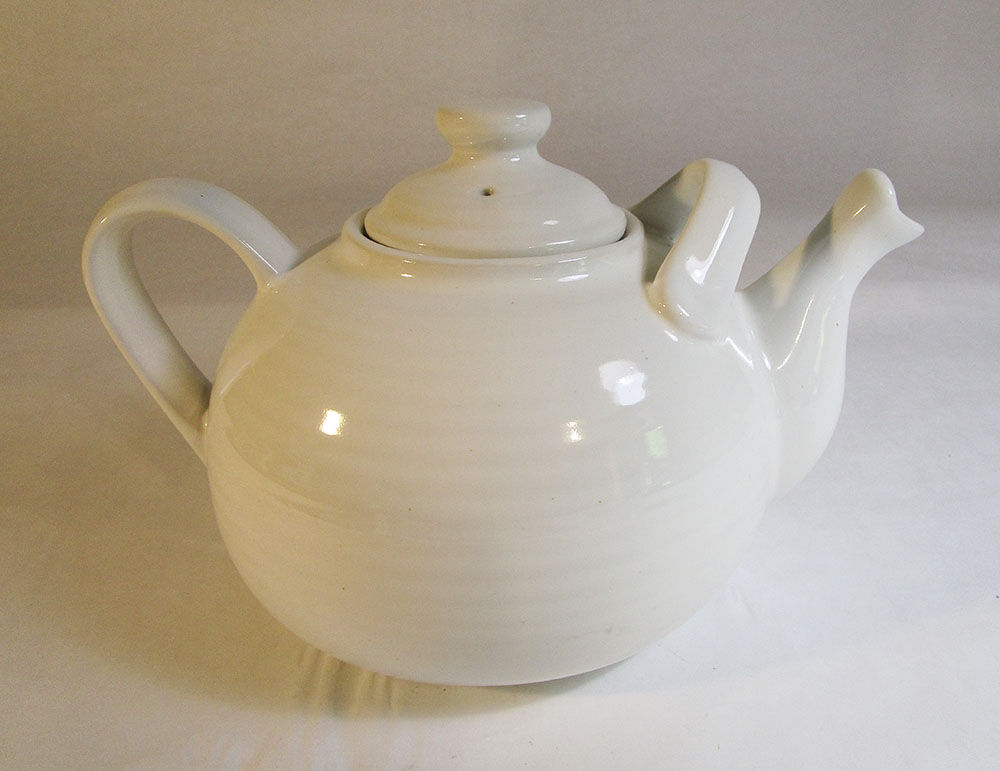 Large white ceramic teapot