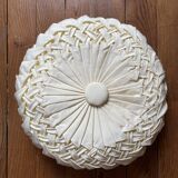 Cushion in beige fabric