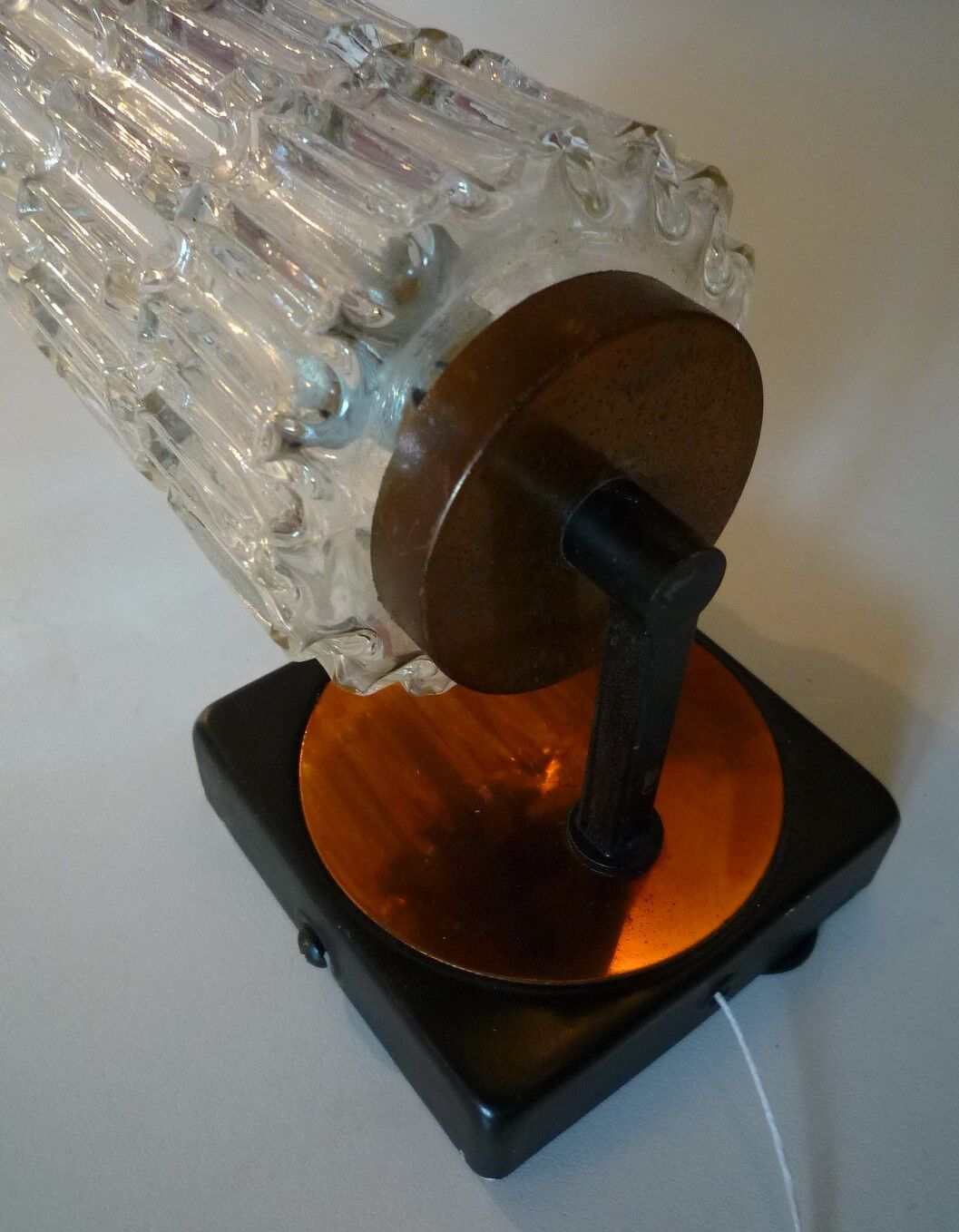 Pair of black lacquered metal, brass and glass wall light