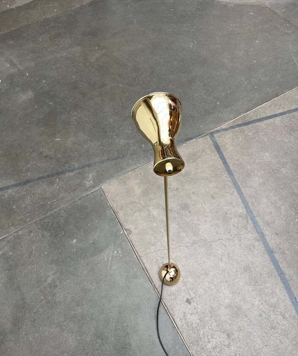 Minimalist brass floor lamp from the mid-century by Dieter Schulz for Wohnbedarf Ag, 1950s.