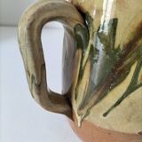 Glazed earthenware jug