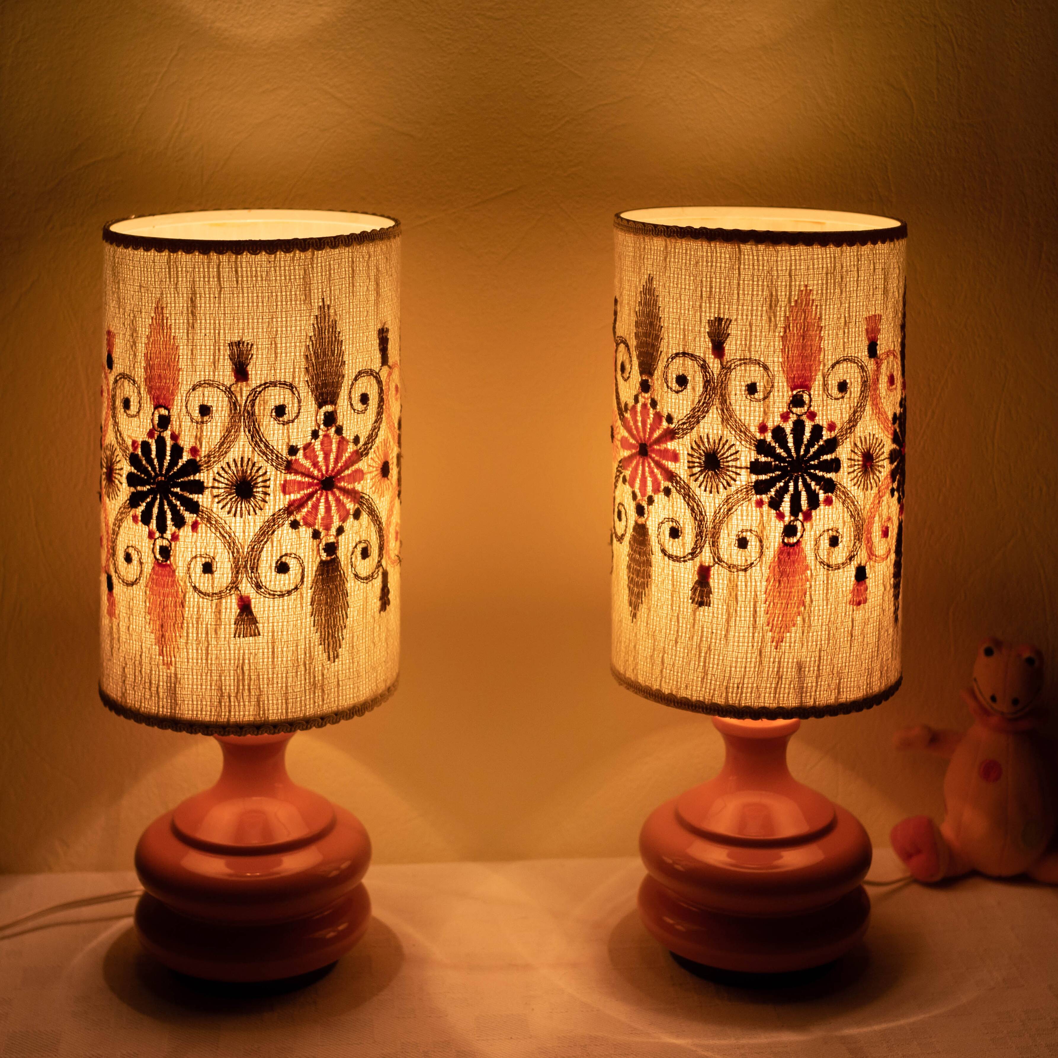 Pair of embroidered orange lamp