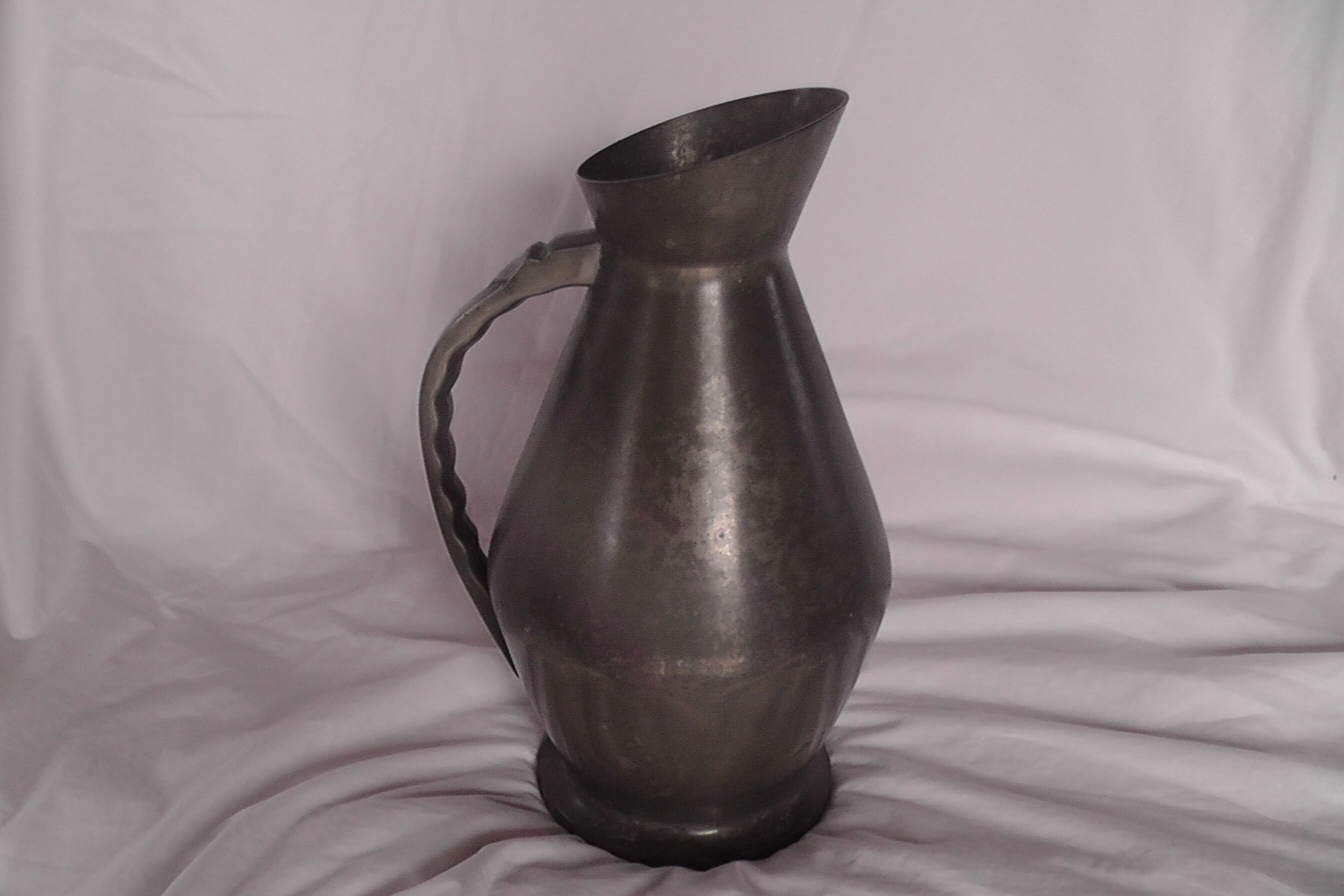 Tin pitcher vase of the manor