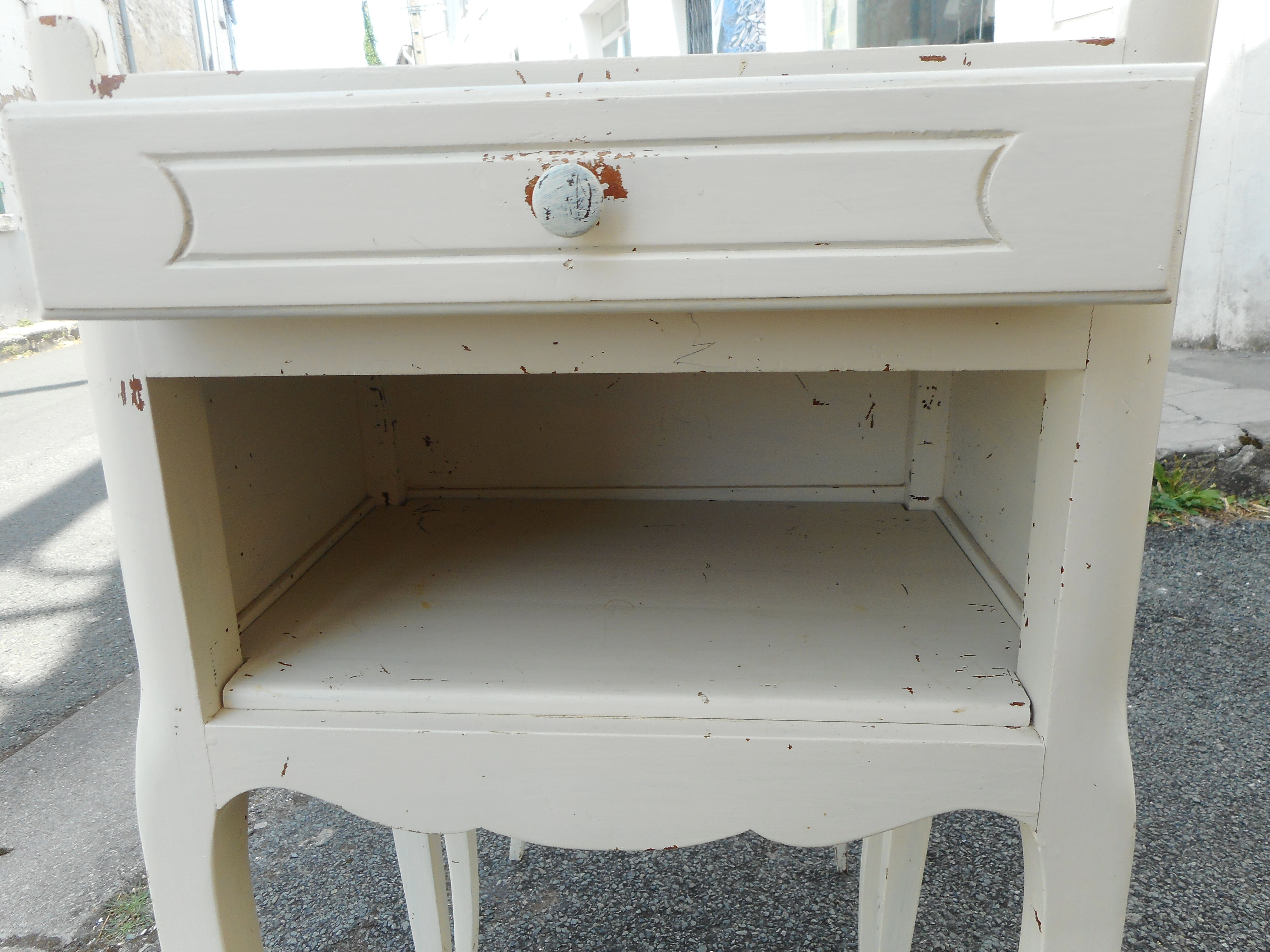 Pair of white lacquered bedside tables