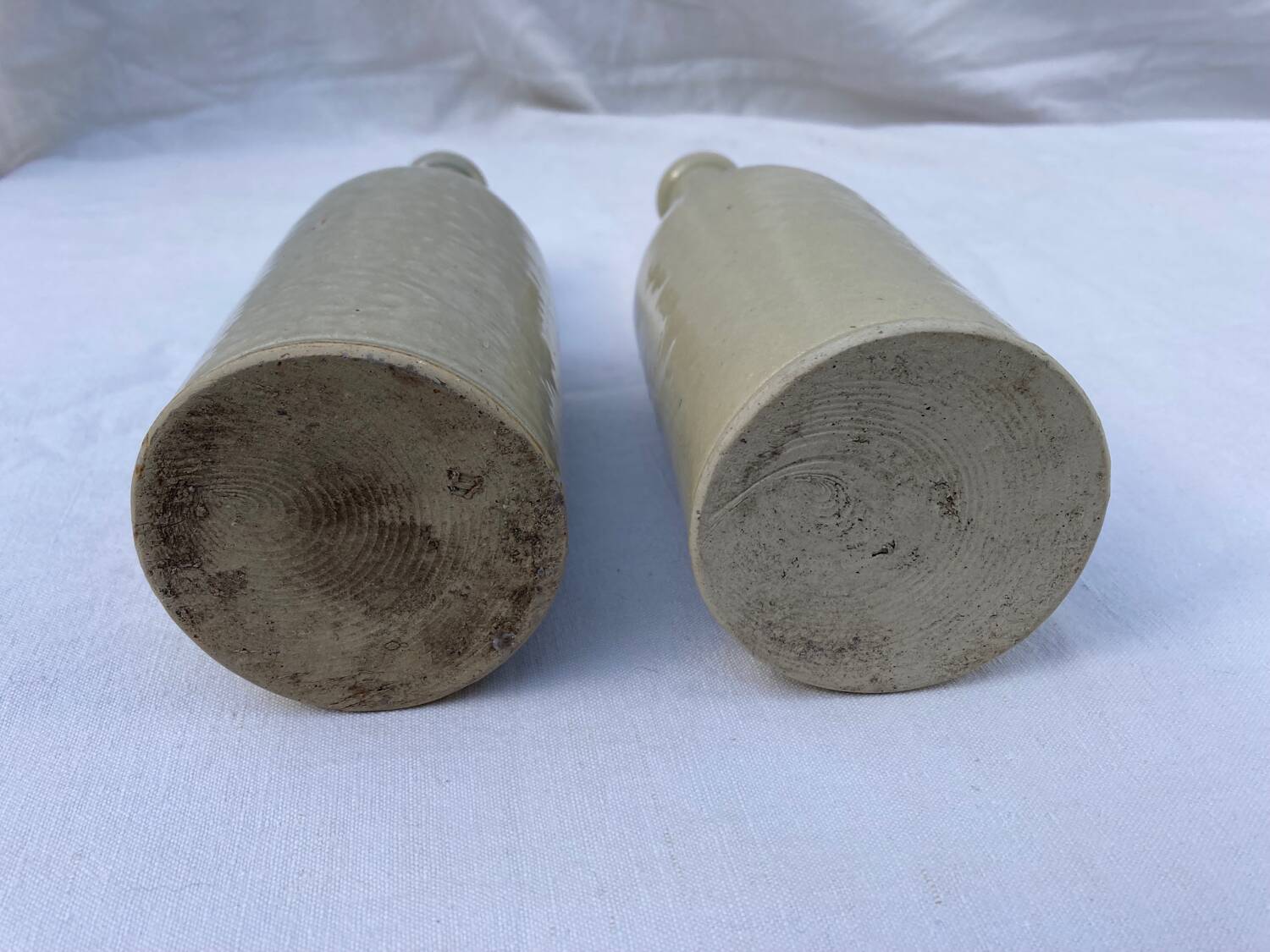 Pair of old Bossot stoneware bottles