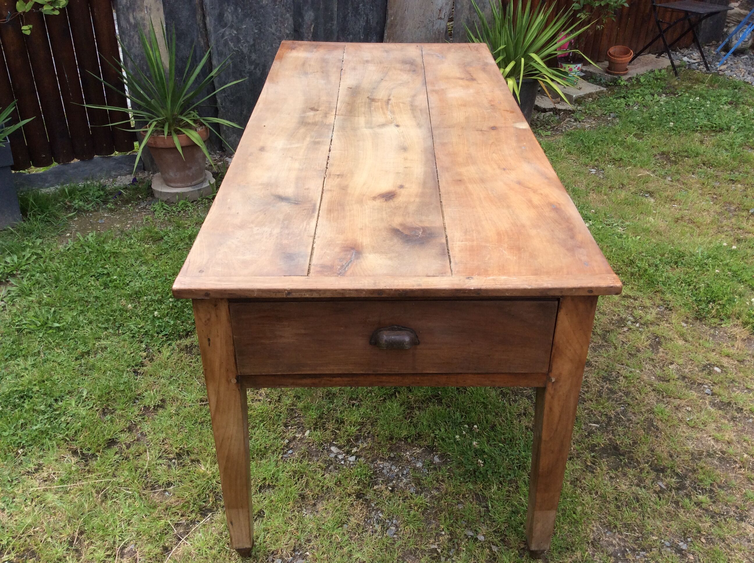 Farm table in cherry tree of the country of Redon with spindle feet.