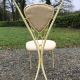 4 vintage chairs in tubular metal lacquered white yellow.