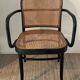 Canned bistro armchair and curved wood from the 60s