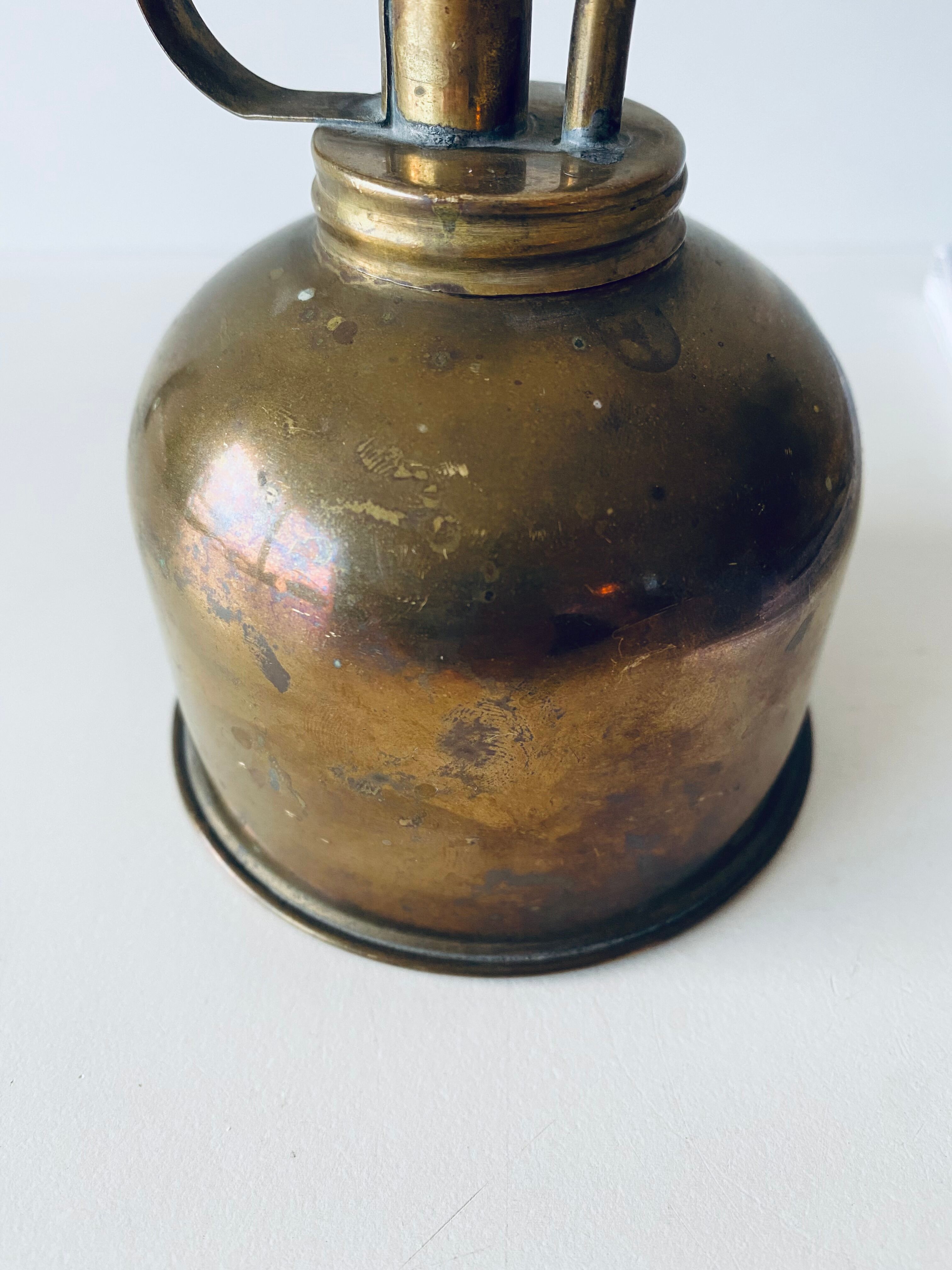 Old brass mist for indoor plants