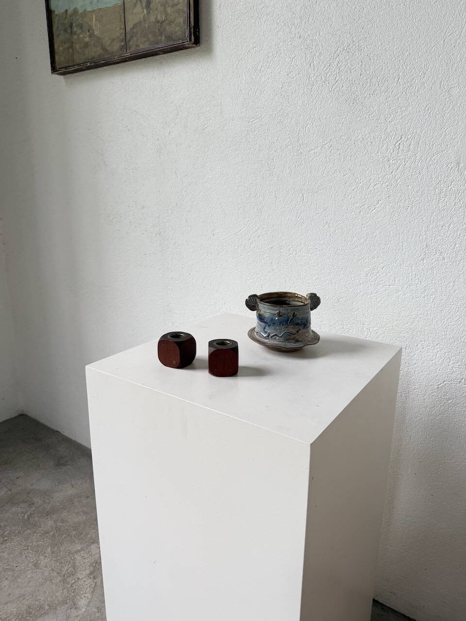 Pair of 1960s teak and brass "dice" candlesticks