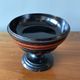 Round covered standing box in lacquered wood, Japanese work of the 1930s.