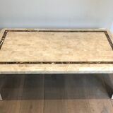 Coffee table made of marble plates with inlay of a brass net. French Work