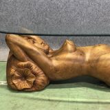 Low table, exotic wooden footing depicting a