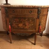 Half-moon chest of drawers