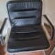 Pair of leather and aluminum armchairs