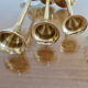 Series of 3 Scandinavian brass candle holders, 70s tulip foot