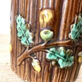 Antique slip pot with acorn decoration