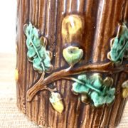 Antique slip pot with acorn decoration