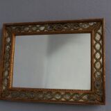 1940 style mirror in open gilded wood