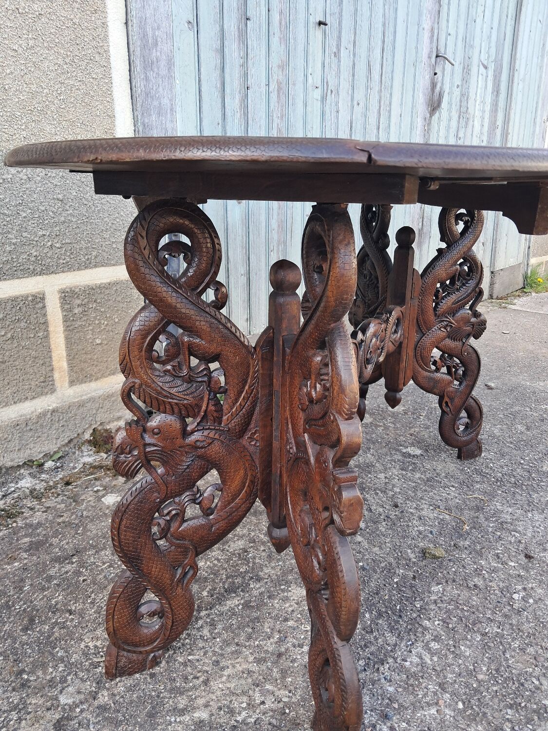 Asian table, mid-height, made of exotic wood.