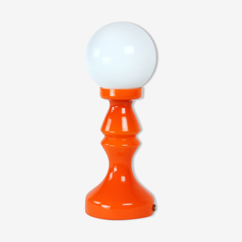 Orange glass table lamp by vitropol, poland 1960s