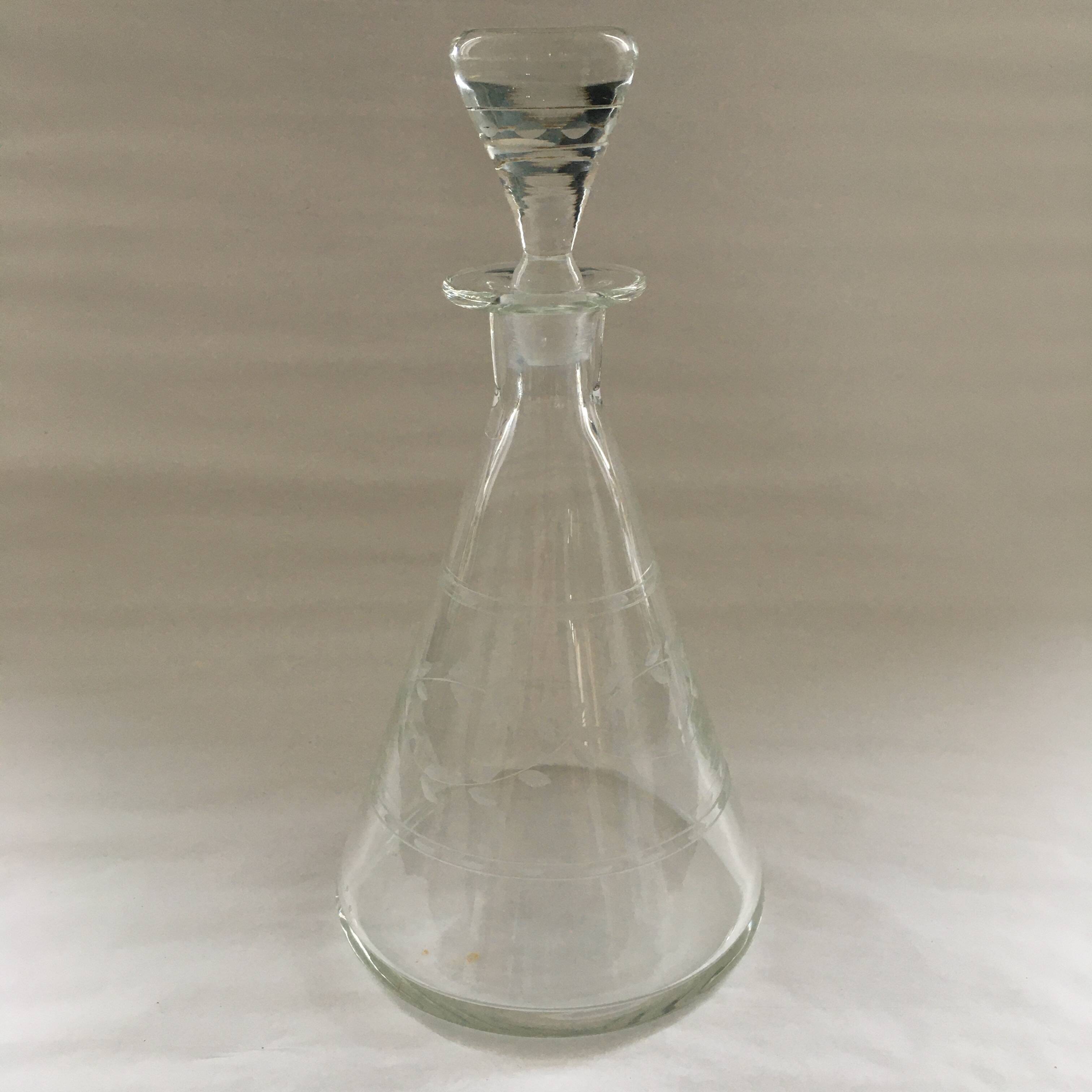 Carafe with chiseled floral decoration