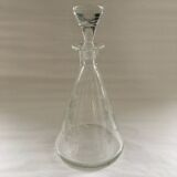 Carafe with chiseled floral decoration