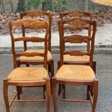 4 Louis XV chairs in solid oak with rush seats, shell carvings, 19th century.