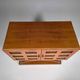 Mid-century modern mobile bar cabinet with sculptural base, 1950s.